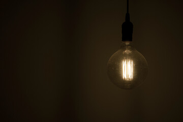 A yellow light bulb that illuminates the room
