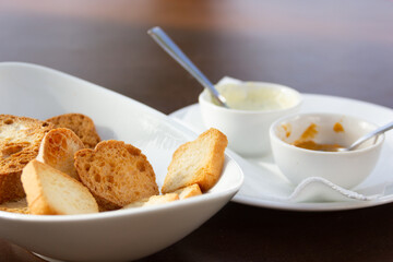 Little bread canapes bowl with spicy sauces. Small bite, appetizer concepts