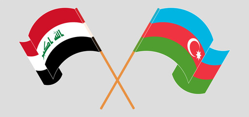 Crossed and waving flags of Iraq and Azerbaijan