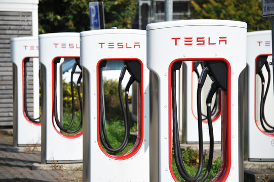 Bispingen / Germany - September 17, 2020: Tesla Supercharger Station near Bispingen, Germany - Tesla is an American electic vehicle and clean energy company