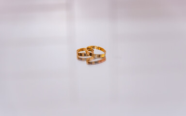 Wedding Rings On A Mirror