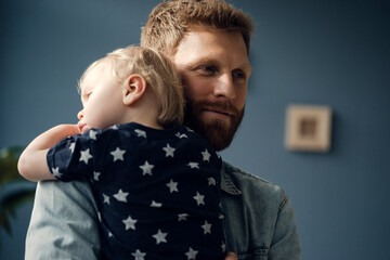 Father spending time with his son at home