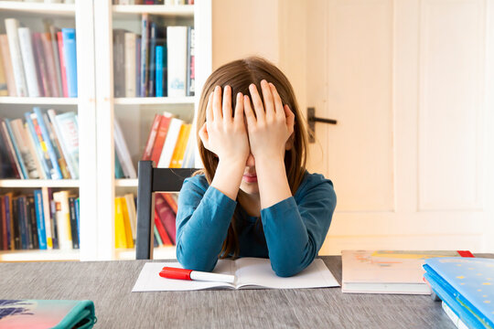 Frustrated girl with homework