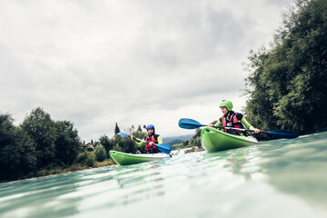Germany, Bavaria, Allgaeu, couple kayaking on river Iller