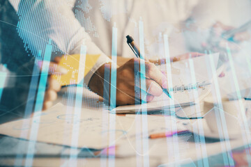 Double exposure of forex graph drawing over people taking notes background. Concept of financial...
