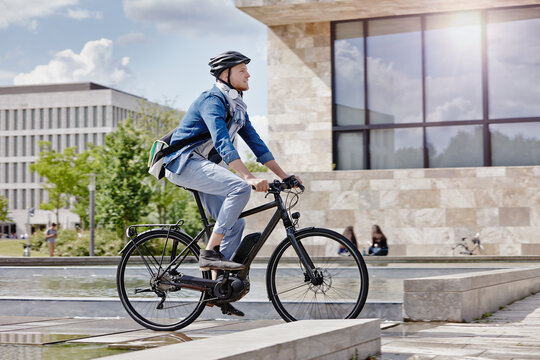 Student on his e-bike at Goethe University in Frankfurt, Germany