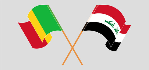 Crossed and waving flags of Iraq and Mali