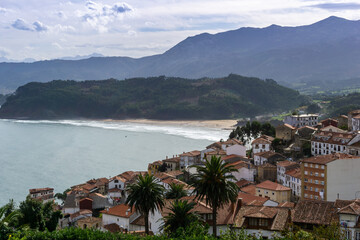 beautiful small village on the coast of Asturias nestled on a hillside © makasana photo