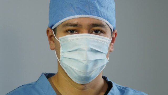 Male Healthcare Worker In A Mask