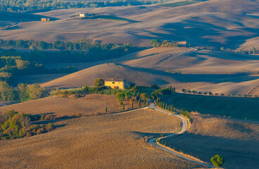 Fototapeta na wymiar Typical Tuscan farm in Val d’Orcia, Tuscany, Italy