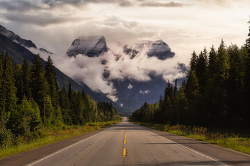 Beautiful View of Yellowhead Highway with Mount Robson in the background during a cloudy summer morning. Taken in British Columbia, Canada.