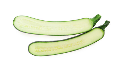 Halves of ripe zucchini on white background, top view