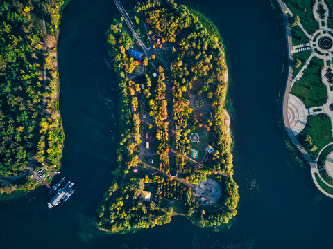 Drone shot of amusement park amidst Kotorosl River