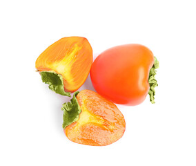 Delicious cut and whole fresh persimmons isolated on white, top view