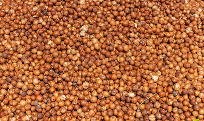Kadenahalli, Karnataka, India - November 3, 2013: Closeup of heap of dried betel nuts ready to be sold and processed.