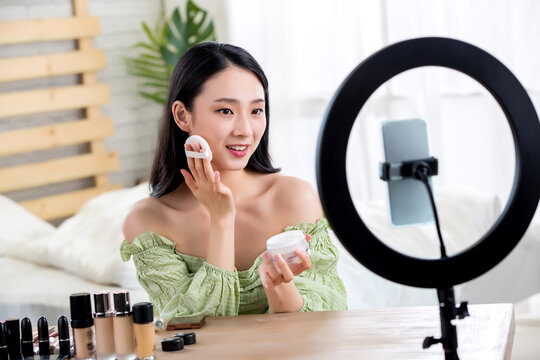 Young women live online makeup