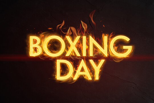 Flaming text Boxing Day on dark background