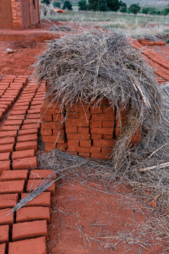 Row of adobe bricks on the floor