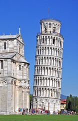 The Leaning Tower of Pisa. The beautiful tower, the campanile or bell tower of the Basilica is seen leaning in comparison to the Basilica. The tower leans 4 degrees from vertical at present.