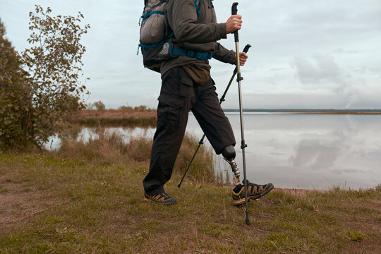 Unrecognizable Disabled Traveller Hiking - Powered by Adobe