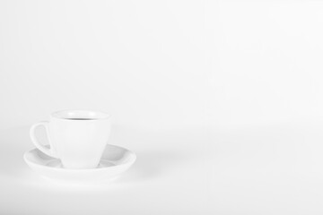 Isolated coffee mug, with a black coffee on white background.