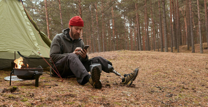 Traveller Using Smartphone While Waiting For Roaster Heating - Powered by Adobe