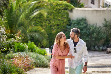 Couple on holiday taking a walk