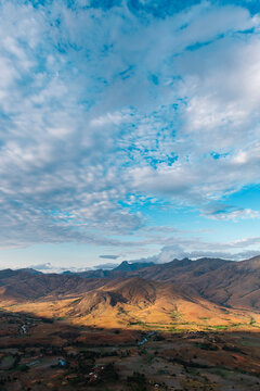Cloudscape over rocky mountain peaks