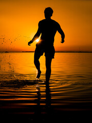 silhouette of a person on sunset. Keep going forward, achieve succes, make your dreams come true