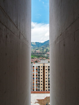 Houses on hillside in Medellin suburbs on cloudy day