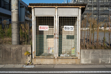 Typical dump site of an apartment house in Japan. Translation: "
Burnable garbage / Non-burnable garbage"