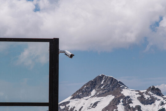 Mountain winter landscape and surveillance camera