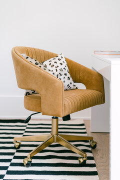 Gold chair in home office work space
