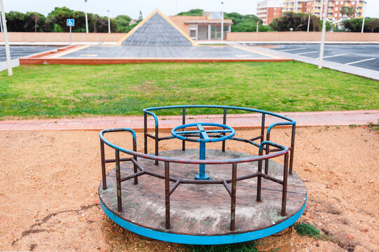 Isolated blue swing in children playground