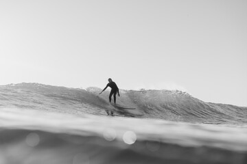 surfer on wave in the ocean