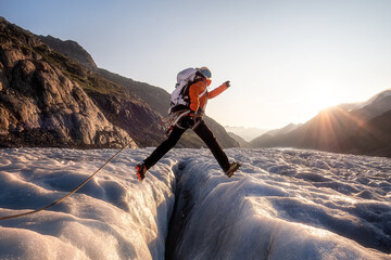 brave woman jumping over crevasse