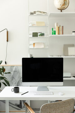 minimal home office with imac in bright organized studio