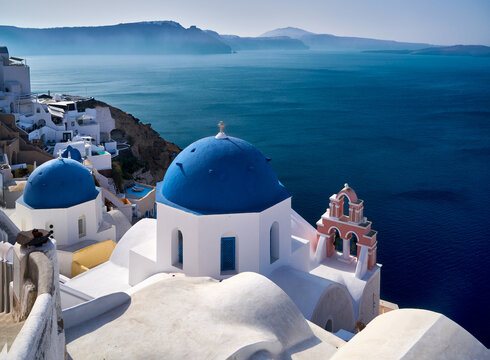 Famous blue dome church in Oia, Santorini.