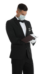 Waiter in medical face mask taking order on white background