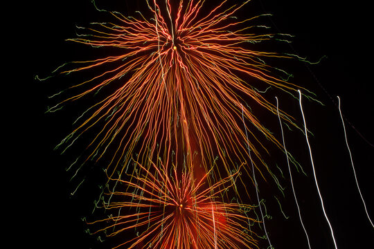 Abstract and colorful patterns of fireworks explosions at Christmas celebrations