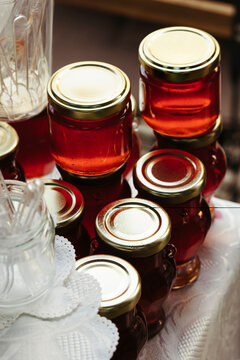 Jars of jam on the table.