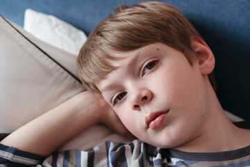 Little cute boy at home.