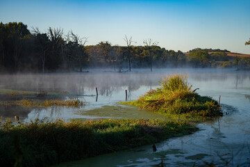 foggy lake in  morning