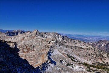 View of Pfeifferhorn peak and Lone Peak Wilderness mountain landscape from White Baldy and Pfeifferhorn trail, towards Salt Lake Valley, Wasatch Rocky mountain range, Utah, United States. 