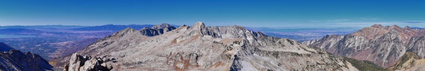 View of Pfeifferhorn peak and Lone Peak Wilderness mountain landscape from White Baldy and Pfeifferhorn trail, towards Salt Lake Valley, Wasatch Rocky mountain range, Utah, United States. 