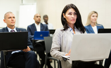 international group of businessmen with computer at world training courses