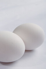 Still life photography of a pair of eggs.
