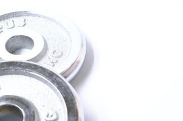 Obraz premium dumbbell weights on white background