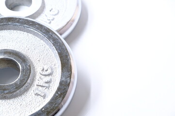 dumbbell weights on white background