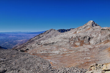 View of Pfeifferhorn peak and Lone Peak Wilderness mountain landscape from White Baldy and Pfeifferhorn trail, towards Salt Lake Valley, Wasatch Rocky mountain range, Utah, United States. 